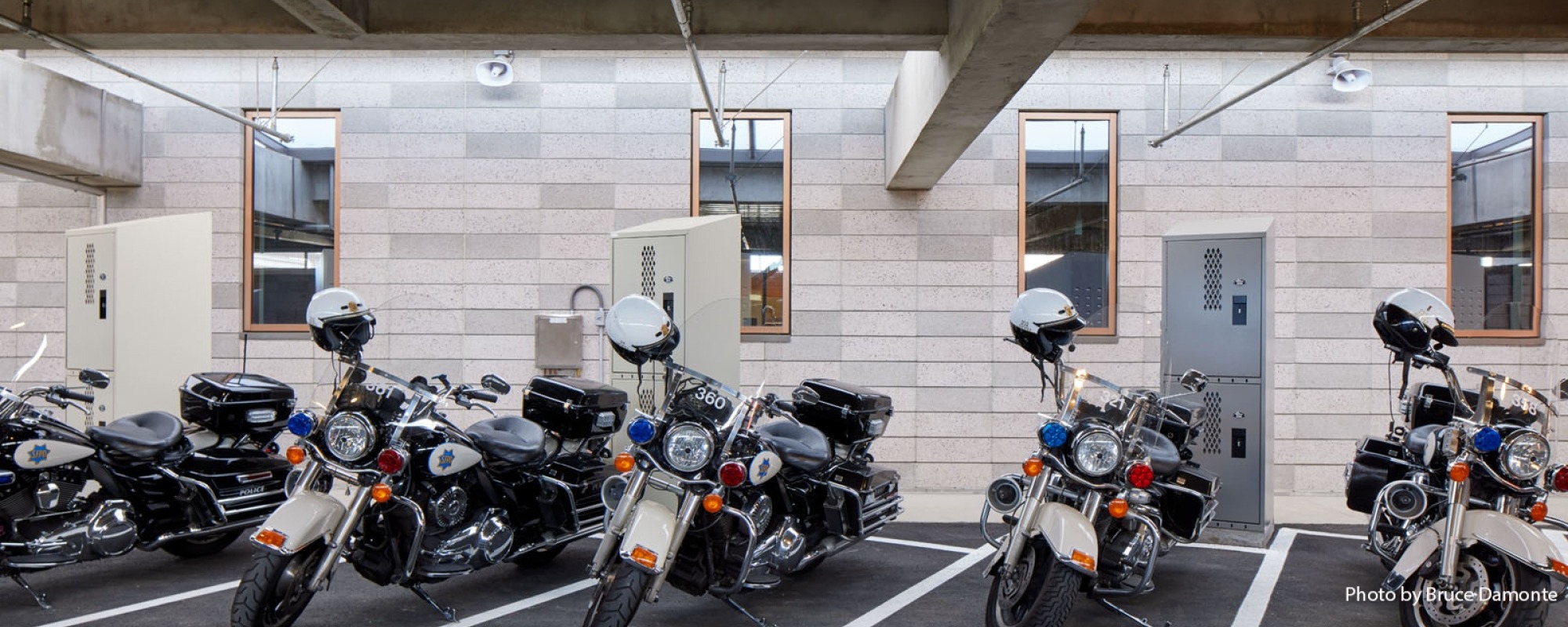 Police motorcycles are parked at the Traffic Company and Forensic Services Division facility.