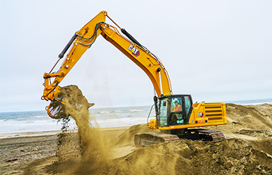 A bulldozer moving sand