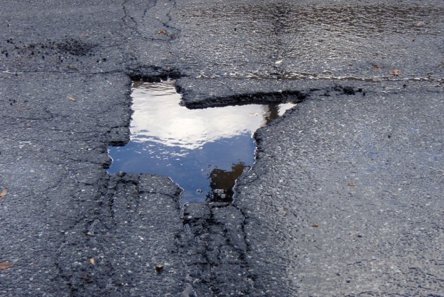 A pothole with the shape of Texas