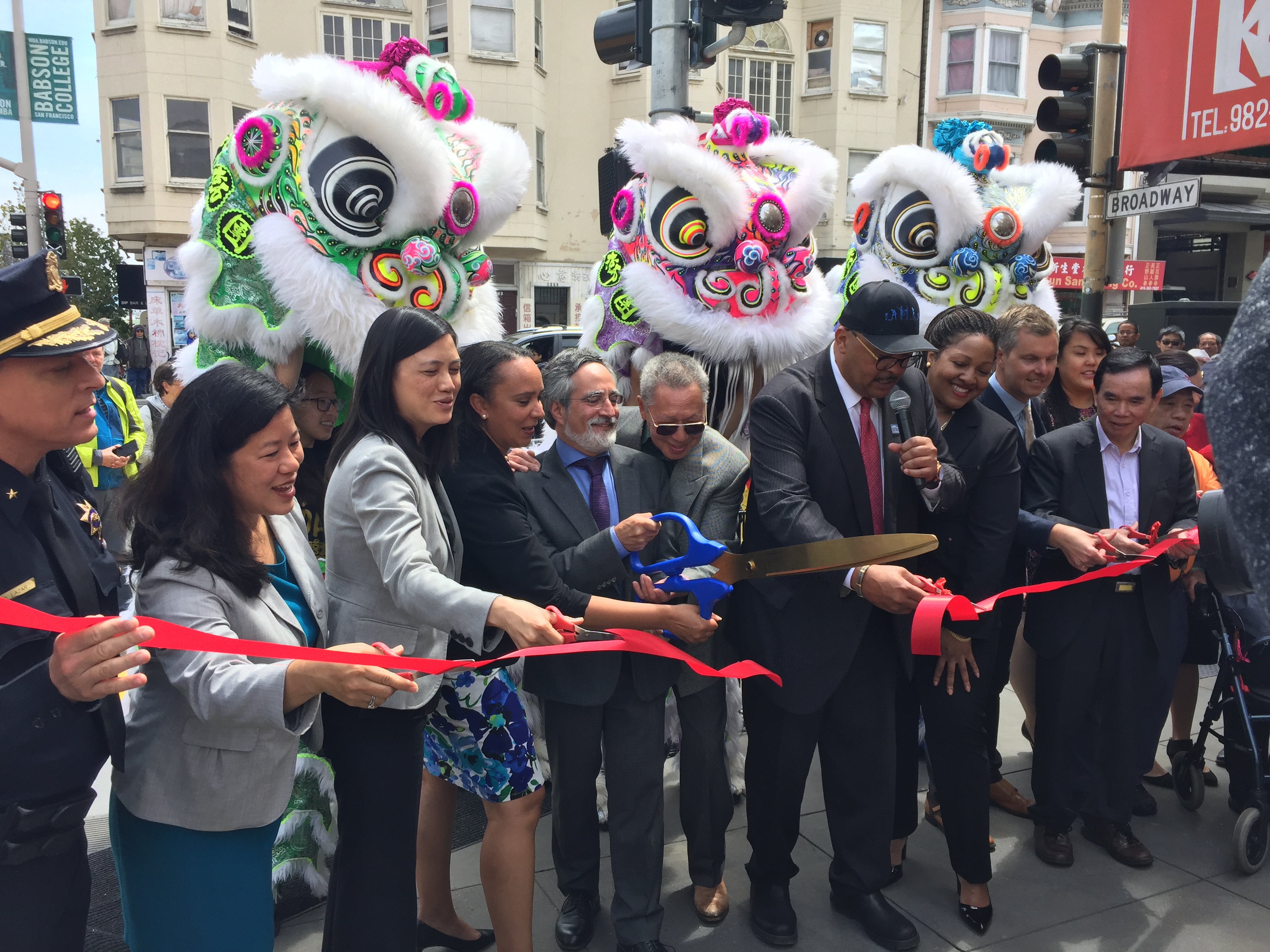 cutting the ribbon at the chinatown streetscape improvement project