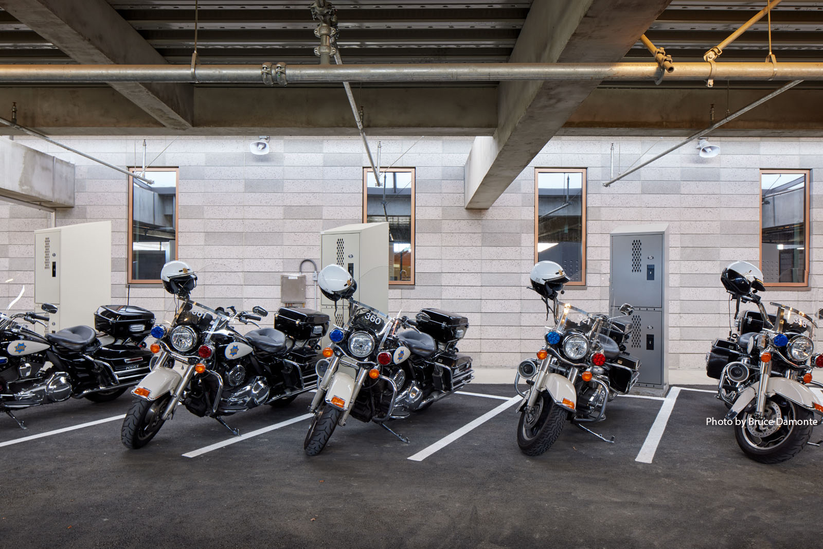 Police motorcycles are parked at the Traffic Company and Forensic Services Division facility.