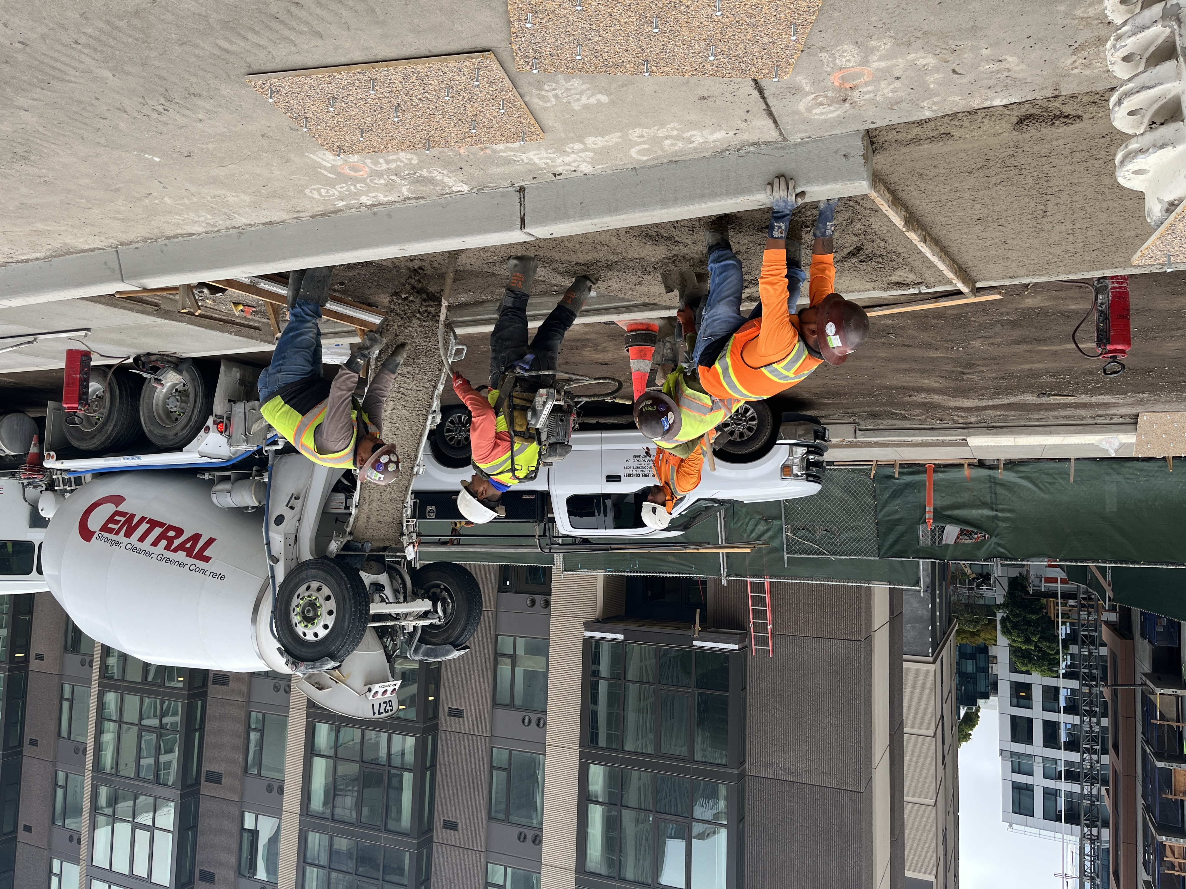 photo of sidewalk being poured on East Clementina Street