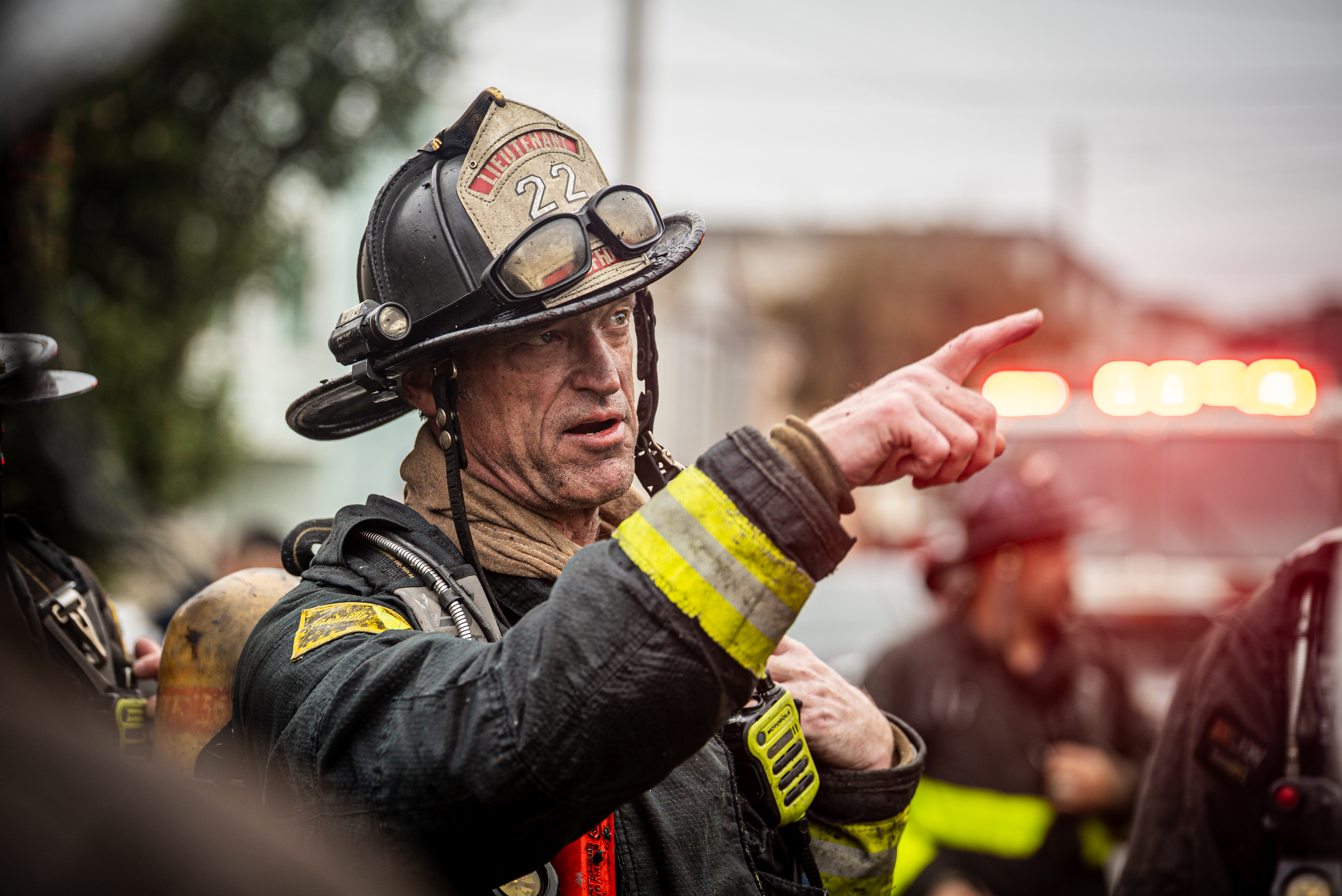 A firefighter gestures during an emergency 