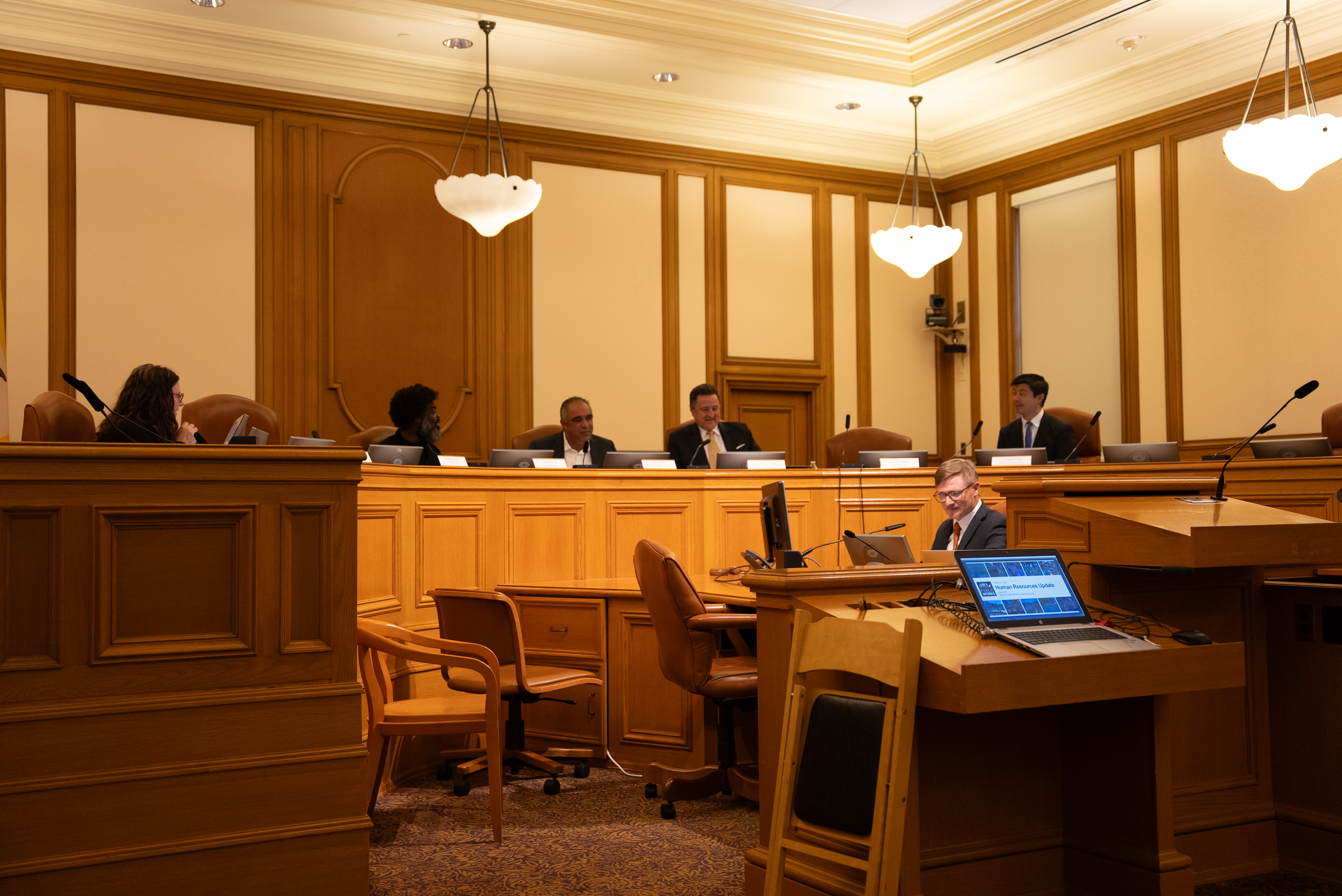 A photo of the Public Works Commission in session.