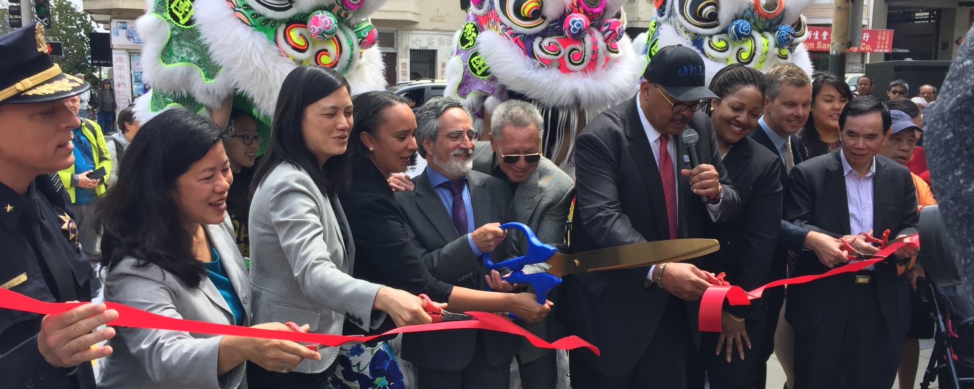 cutting the ribbon at the chinatown streetscape improvement project
