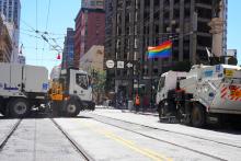 Public Works cleaning crews clean up after the Pride Parade